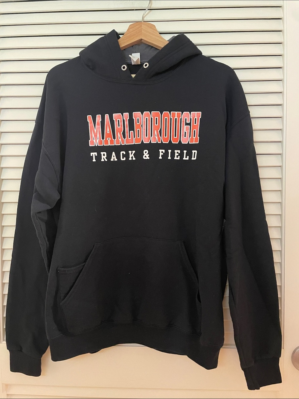 Marlborough High School Black Hoodie with Orange Logo